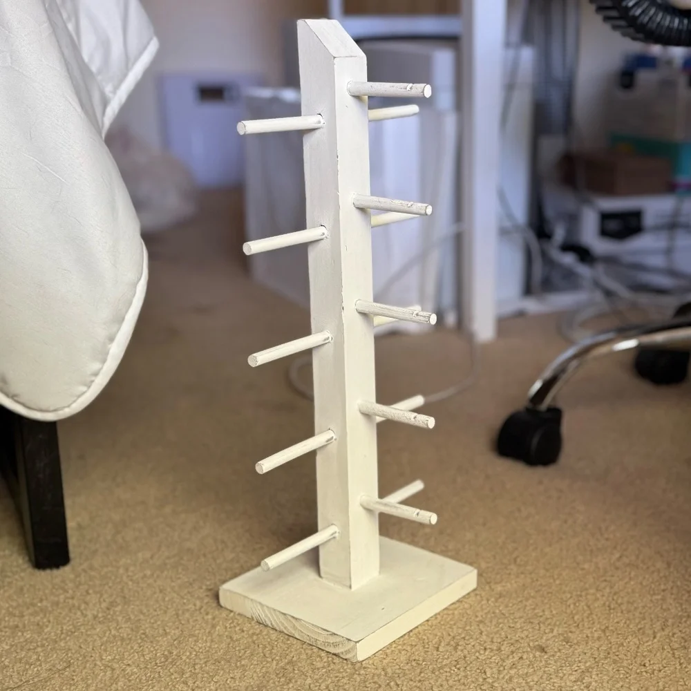 white wooden sunglass organizer and display stand